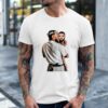 Kendrick Lamar Holding Baby Drake shirt