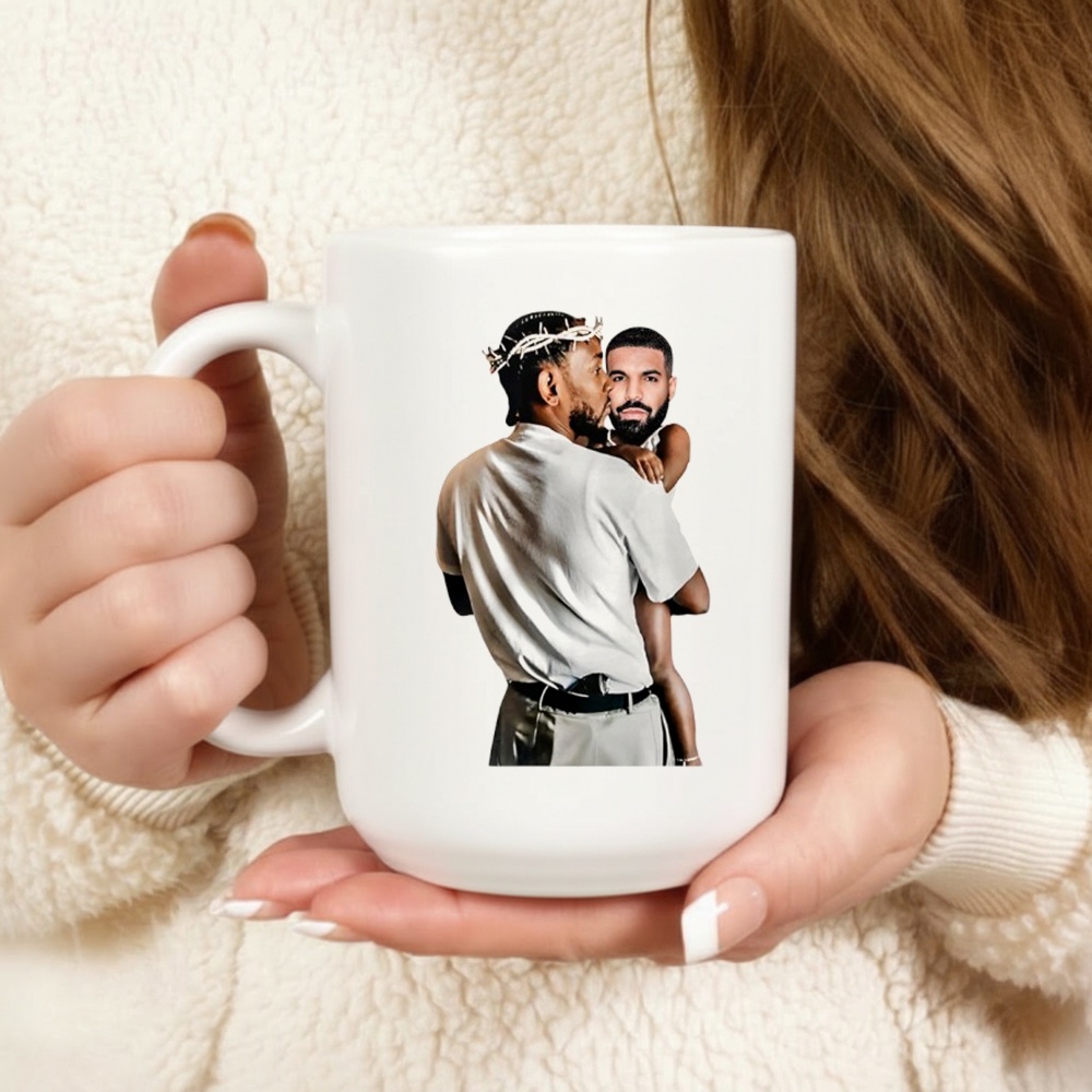 Kendrick Lamar Holding Baby Drake shirt